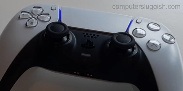 PlayStation 5 controller showing a blue colour light.